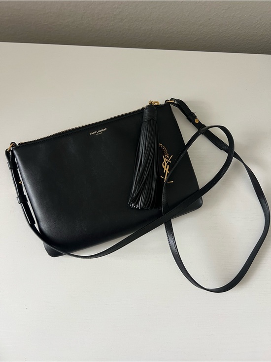 Saint Laurent Handbags - Saint Laurent Black Leather Crossbody with Tassel and Gold Logo